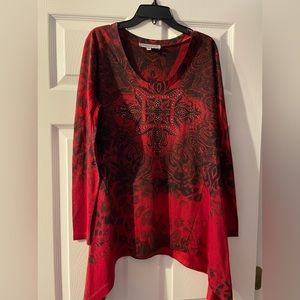 long sleeve blouse bright red with black design and rhinestones.